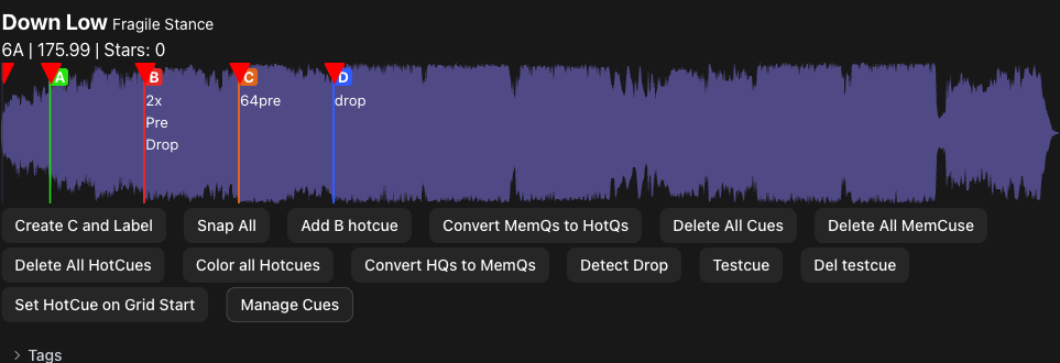 Track waveform with colored cue markers, key, BPM and one-click action buttons
